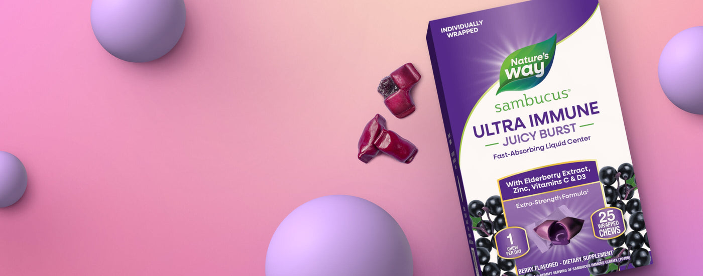 Nature's Way Sambucus Ultra Immune Juicy Burst product packaging on a pink background with purple spheres.