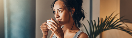 Woman drinking coffee in the morning.