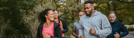 Group of people on a run in the forest