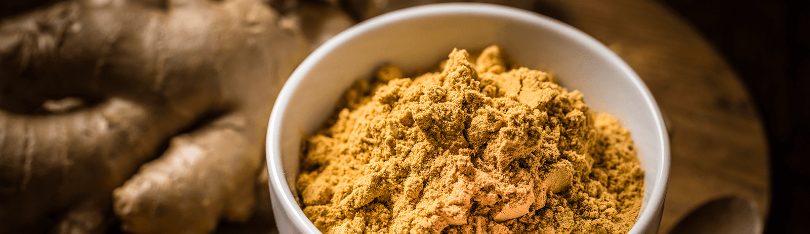 Ginger in powder and root form. 
