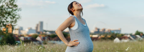 pregnant woman in field