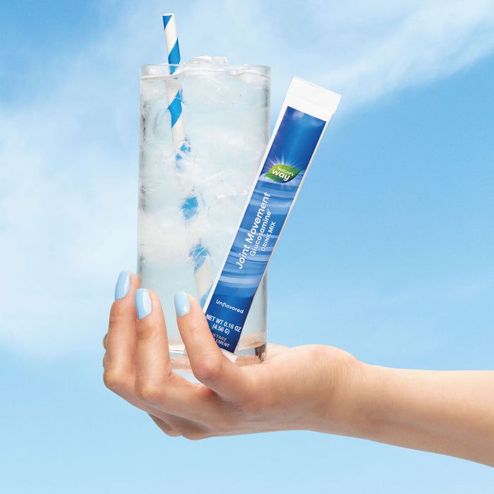 Joint Movement drink in hand with powder pack