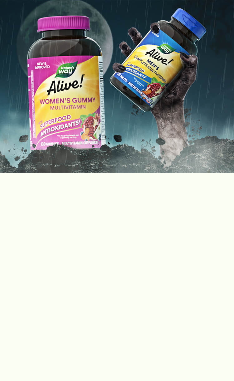 Two bottles of Nature's Way Alive! products on a dark background in dirt with a zombie hand coming out of the ground.