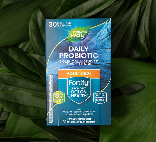 Nature's Way Daily Probiotic package on a green leaf background