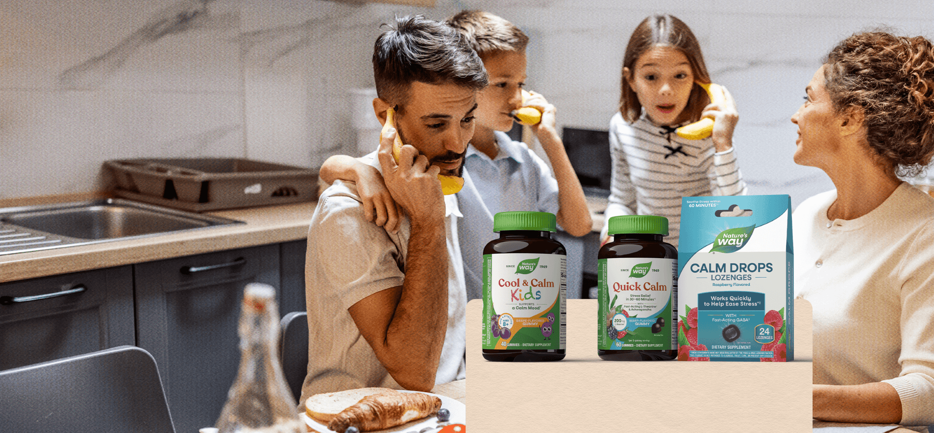 Family at a kitchen table with Nature's Way supplements in front of them