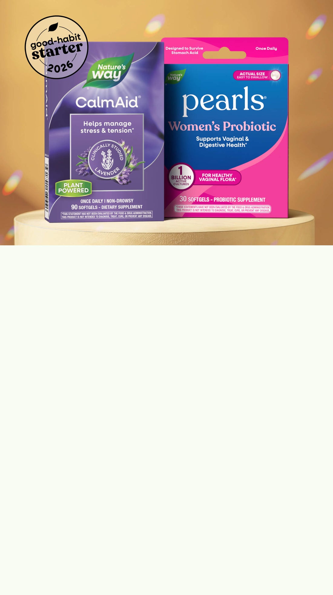 Two supplement packages, CalmAid and Pearls Women's Probiotic, on a white background.