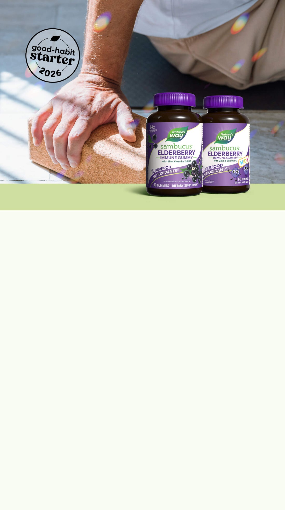 Two bottles of Nature's Way Elderberry supplement on a white background with a 'good habit starter' label.