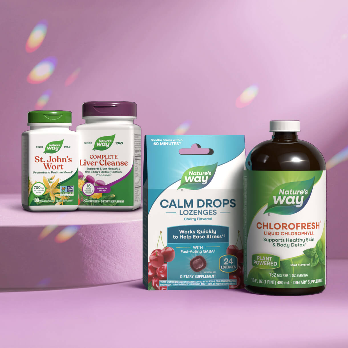 Collection of Nature's Way detox and mood supplements on a pink background