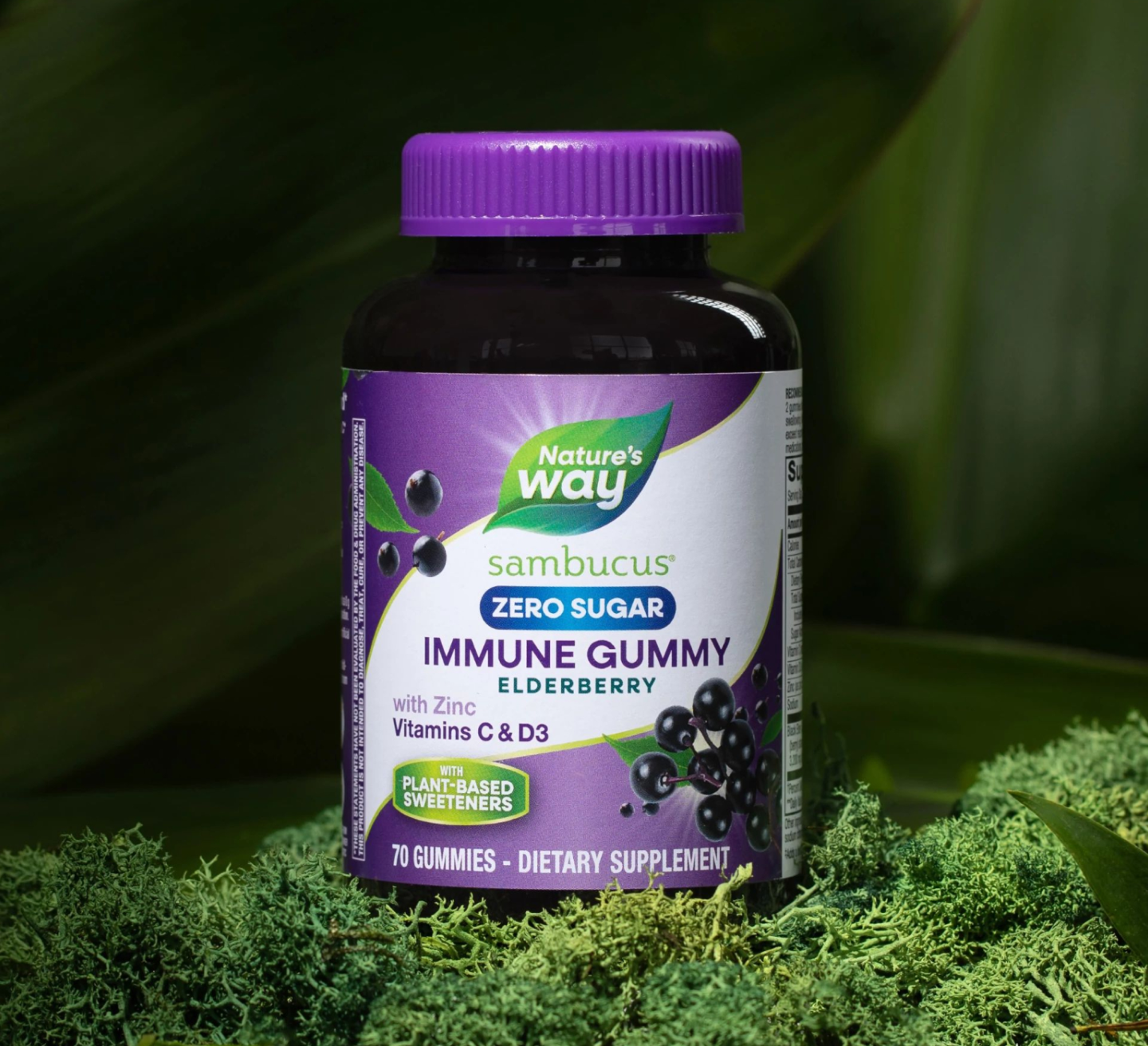 Bottle of Sambucus Zero Sugar Immune Gummy sitting on a bed of moss