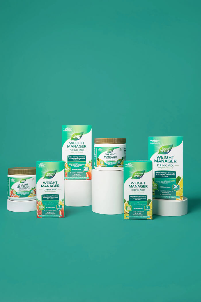 Collection of Nature's Way Weight Manager products on a teal background